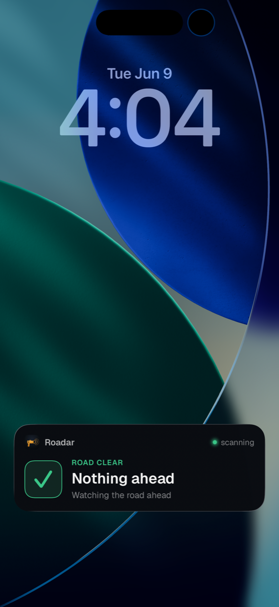 Lock Screen Live Activity in the clear state: road clear, nothing ahead, watching the road ahead